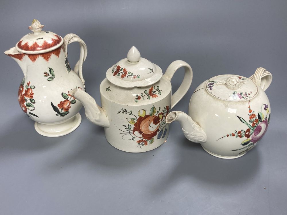 A collection of nine pieces of late 18th century creamware, including bullet-shaped teapot, 11cm high and four tea canisters with silve